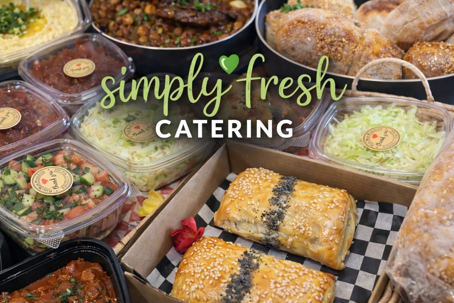 Simply Fresh Catering spread with salads, bourekas, and Mediterranean dishes